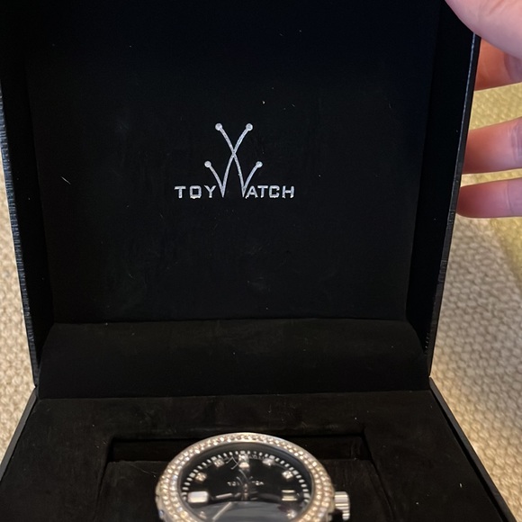 Toy Watch black crystal plasteramic watch. Includes original boxes and extender